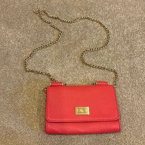 Small coral and gold purse